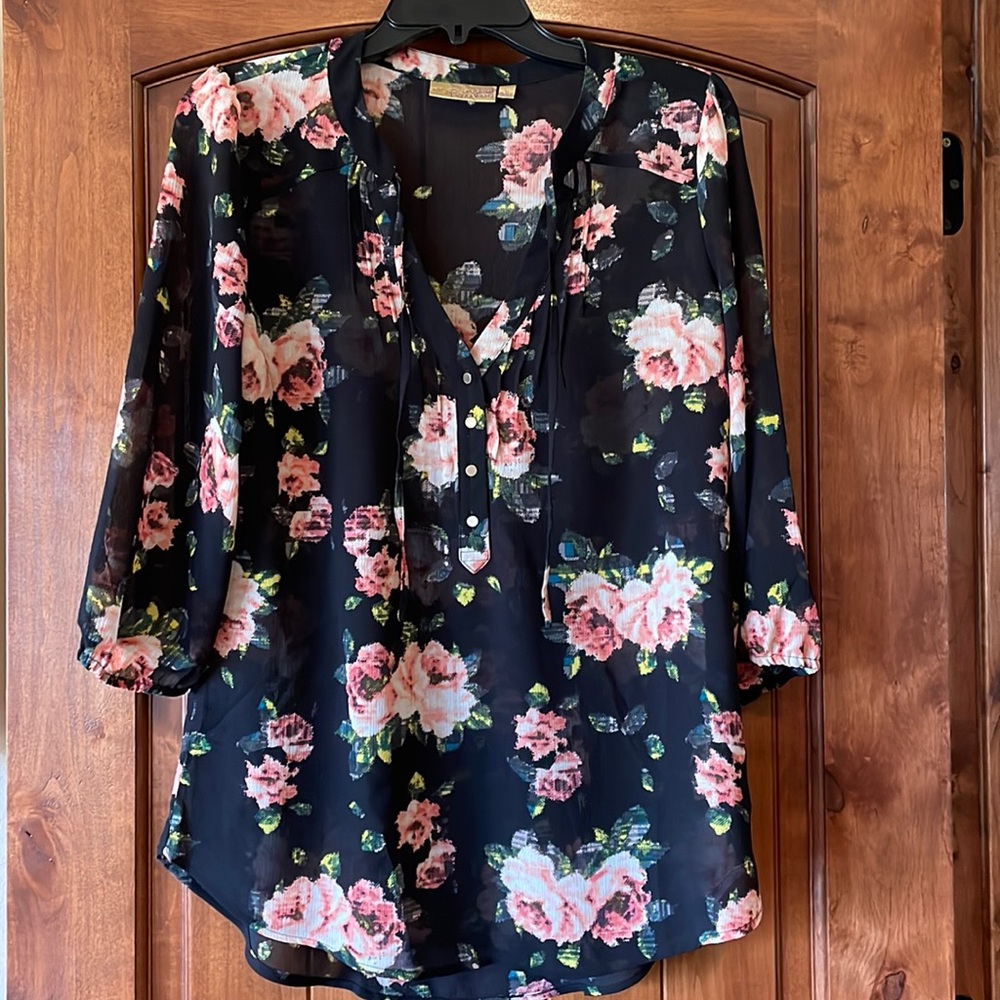 Woman’s sheer v neck floral print blouse